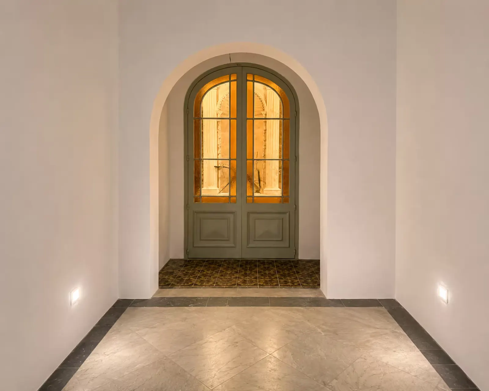 Restored timber doors at the end of the hall
