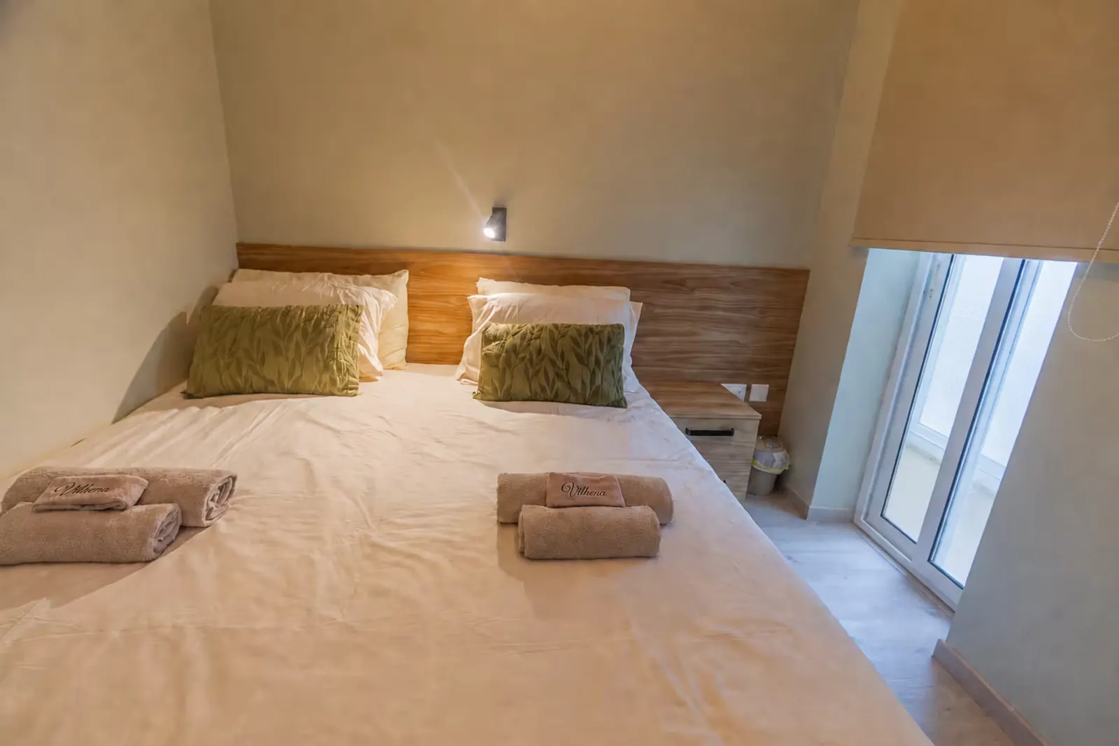 Bedroom with balcony window